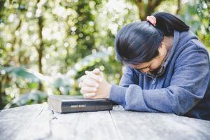 Prayer woman hand photo