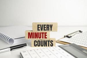 Every minute counts symbol. Concept words Every minute counts on wooden blocks photo