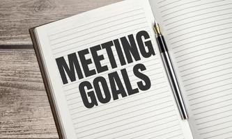 MEETING GOALS text on notepad with pen, business concept photo