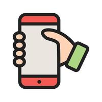 Holding Smartphone Filled Line Icon vector