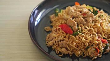 homemade stir-fried instant noodles with Thai basil and minced pork - Thai food style video