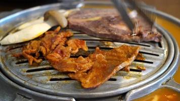 grilled pork and beef meat in Korean style or Korean BBQ video