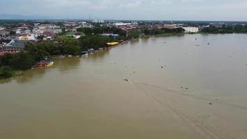 Aerial view boat arrive jetty of Teluk Intan video