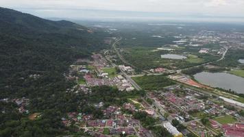 Aerial view panning residential area and abandoned tin mines video