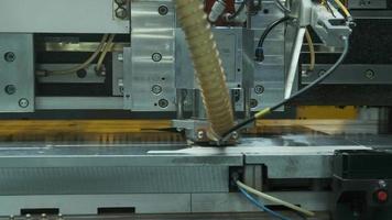 Modern high-tech production of electronic boards and chips at factory. Automatic machine for assembly and installation of SMD components. Assembly line for boards video