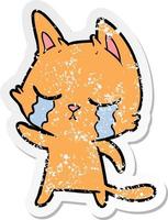 distressed sticker of a crying cartoon cat pointing vector