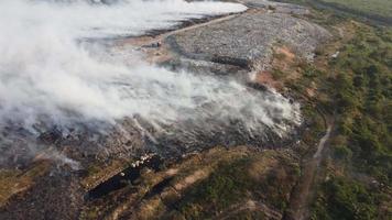 fire burning at landfill site video