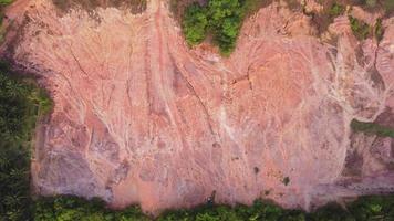 Aerial view look down red soil muddy land video