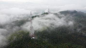 Bird eye view telecommunication tower at hill top video