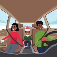 familia conduciendo a un viaje por carretera. vista desde el interior del auto con el padre, la madre y su hijo sentados felizmente con el cinturón de seguridad puesto en un día de navidad