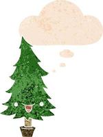 lindo árbol de navidad de dibujos animados y burbuja de pensamiento en estilo retro texturizado vector