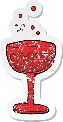 retro distressed sticker of a cartoon sparkling cocktail