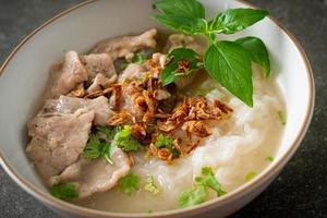 Pho Bo vietnamese soup with pork and rice noodles photo