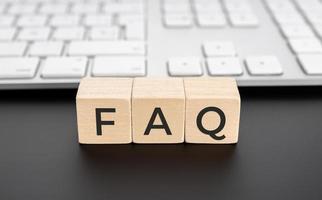 FAQ or frequently asked questions on wooden block photo