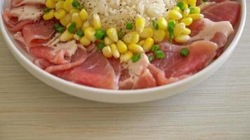 fresh pork raw sliced with rice and corn on white plate and ready to cook video