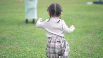 Girl running up to her mother video