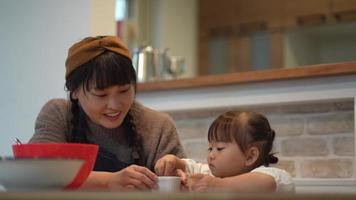 Parents and children making sweets video