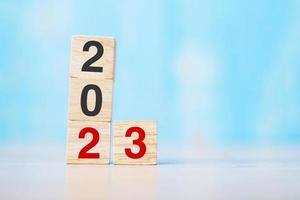 block 2023 text on table. Resolution, strategy, plan, goal, motivation, reboot, business and New Year holiday concepts photo