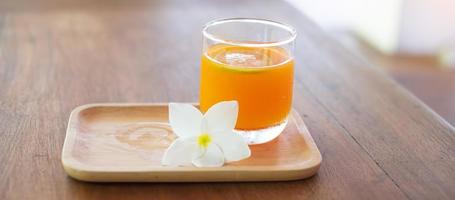 Fresh ice Orange juice in the luxury hotel, welcome drink for guests photo