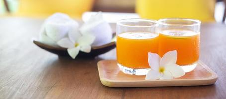 Fresh ice Orange juice in the luxury hotel, welcome drink for guests photo