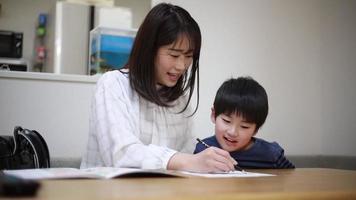 Parents and children studying video