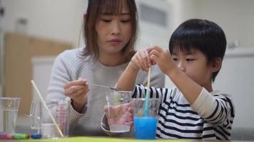 Parent and child making slime