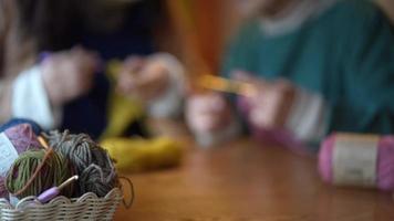 Image of a woman knitting video