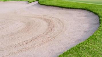 Golf course sand pit bunker aesthetic background,Used as obstacles for golf competitions for difficulty and falling off the course for beauty. photo