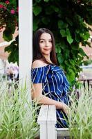 Gorgeous brunette girl portrait in cafe. photo