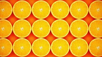 slide left to right Top view Lots of slice and half orange and golden yellow arranged in a row for use as a background or wallpaper. 3D Rendering. video