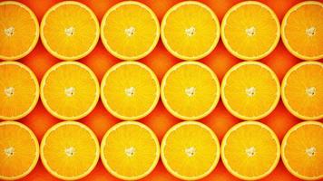 slide left to right Top view Lots of slice and half orange and golden yellow arranged in a row for use as a background or wallpaper. 3D Rendering. video