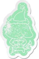 cartoon distressed sticker of a unsure elephant with christmas present wearing santa hat vector