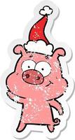 happy distressed sticker cartoon of a pig wearing santa hat vector