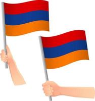 icono de la bandera de armenia en la mano vector