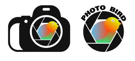 multicolored bird peeps out of camera lens. Creative logo for a photo studio and professional photographer. World Photography Day August 19th. Vector on a white background