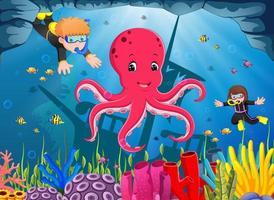 lindo pulpo bajo el mar con niño y niña buceando vector