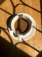 Coffee cup on table top view photo