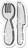 distressed sticker of a cartoon knife and fork vector