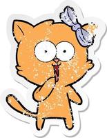 distressed sticker of a cartoon cat vector