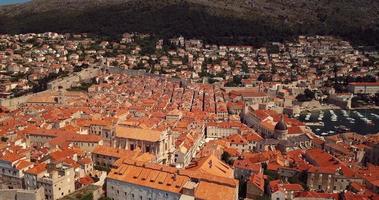 Aerial View to the Old City Fortification and Red Roofs in Dubrovnik, Croatia