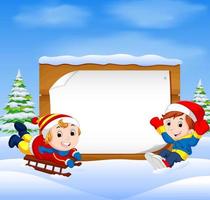 In the winter, kids play in the snow very joyfully vector