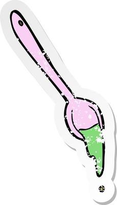 retro distressed sticker of a cartoon spoon