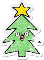 distressed sticker of a cute cartoon christmas tree vector