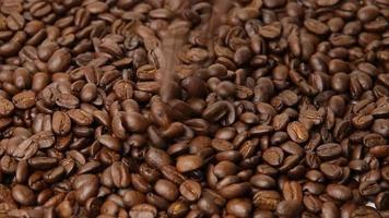 Slow motion of roasted coffee beans video