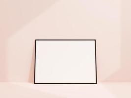 Clean and minimalist front view landscape black photo or poster frame mockup leaning against white wall. 3d rendering.