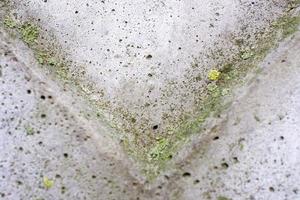 angle down Background. Abstract geometric background of the concrete. photo