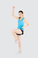 Beautiful portrait young asian woman in sport clothes cheerful with satisfied and confident isolated on white background, asia girl have shape and wellness, exercise for fit with health concept. photo