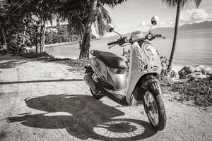 Koh Samui Surat Thani  Thailand 2018 Driving and rent scooters mopeds motorbikes on Koh Samui Thailand. photo