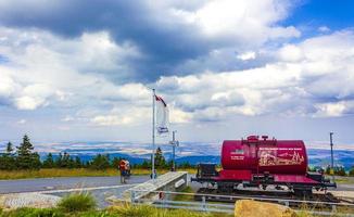 Brocken Lower Saxony Germany 2013 Brockenbahn Locomotive railway train at Brocken mountain peak Harz Germany. photo