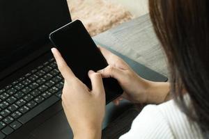 Cropped image of professional business woman working at home office via laptop, manager using portable computer device work process concept photo